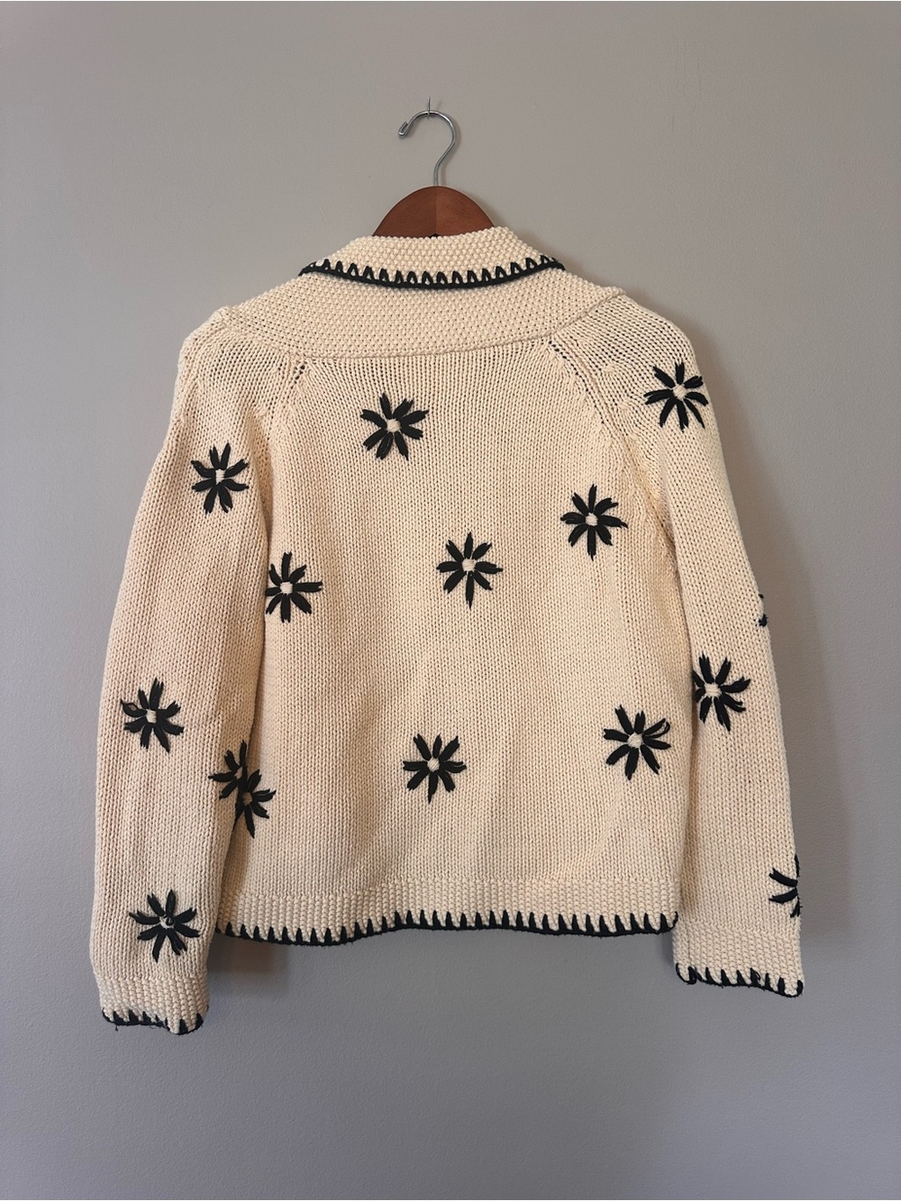 THE GREAT. Cream Open Cardigan with Black Flower Accents - Picture 3 of 5